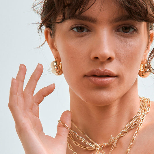 Aretes Crepúsculo dorados