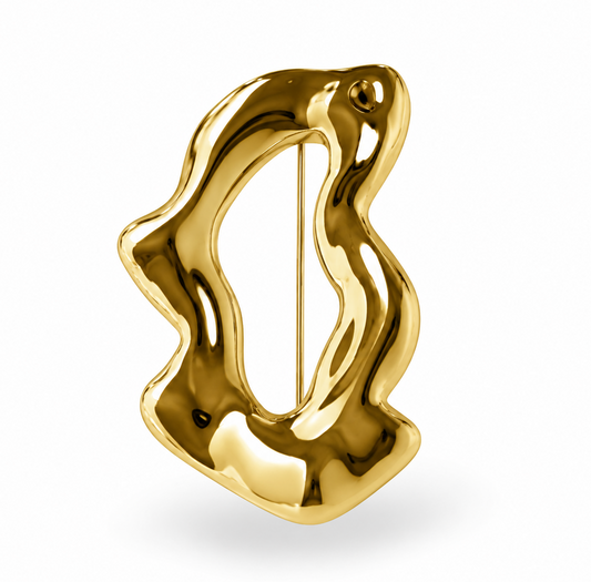 Broche Lía dorado y plateado.